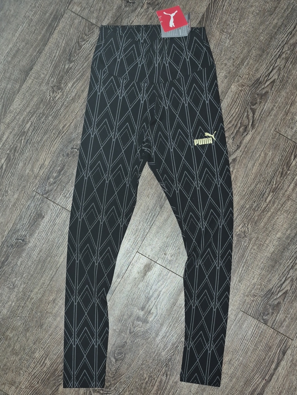 Puma Black Leggings with Gray Geometric Print and Gold Logo